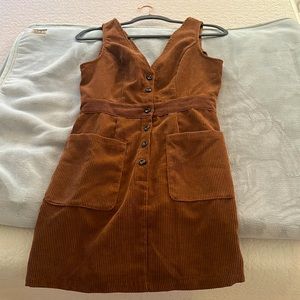 Corduroy material dress. Pockets. Worn once. Perfect with tights. XS